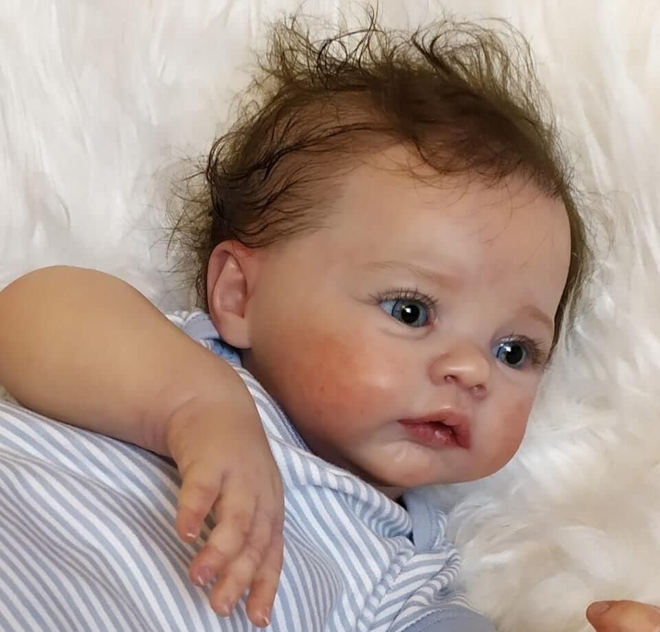 Anano Reborn fully dressed, ready for immediate imaginative play.