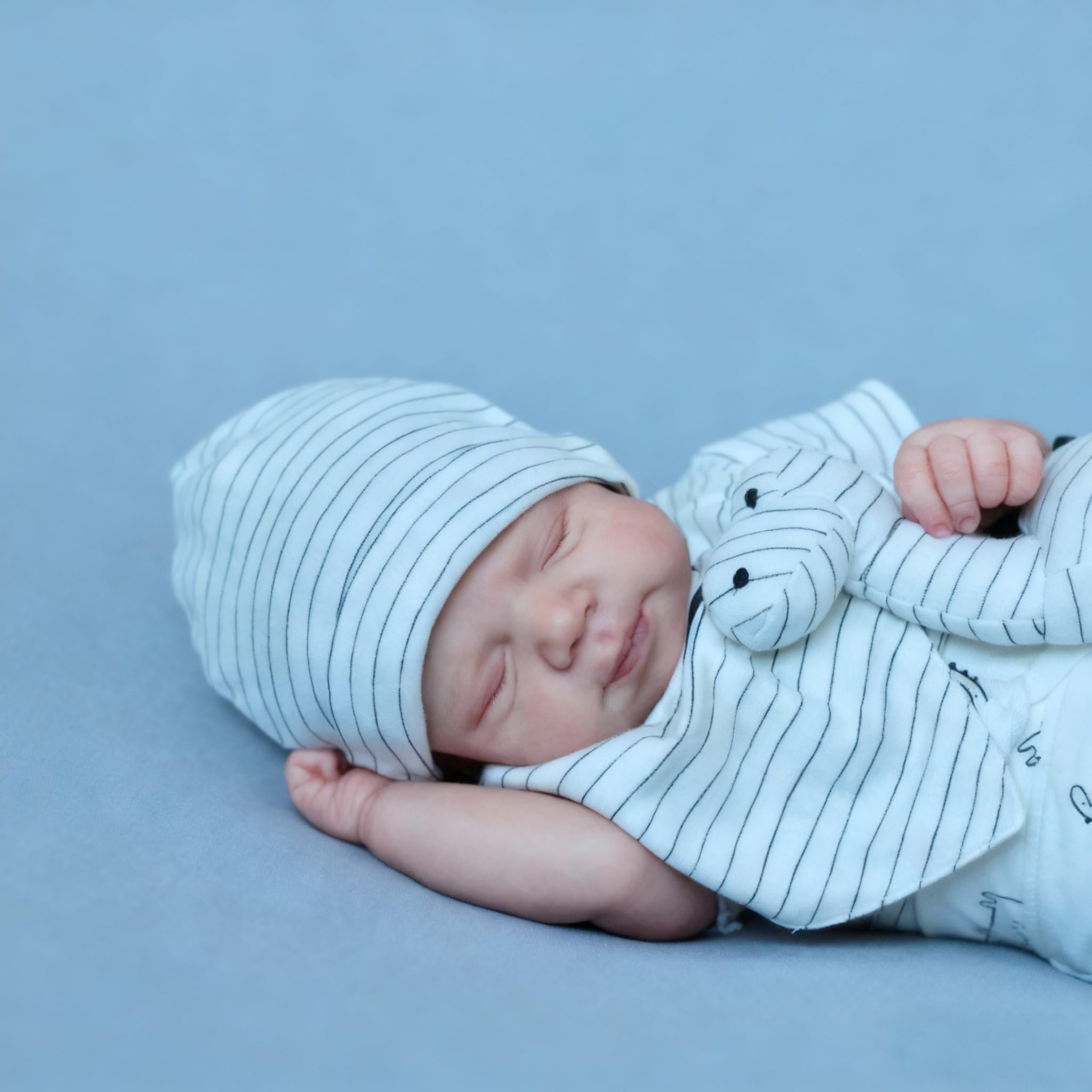 Anano Reborn silicone hands and feet, rooted nails add lifelike charm.