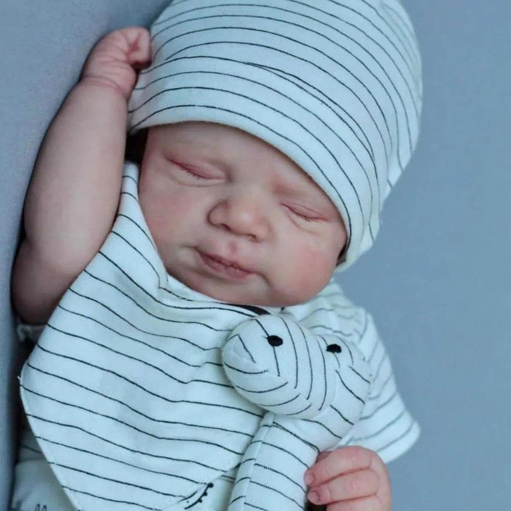 Anano Reborn doll wearing newborn clothes, ready for styling and outfits.