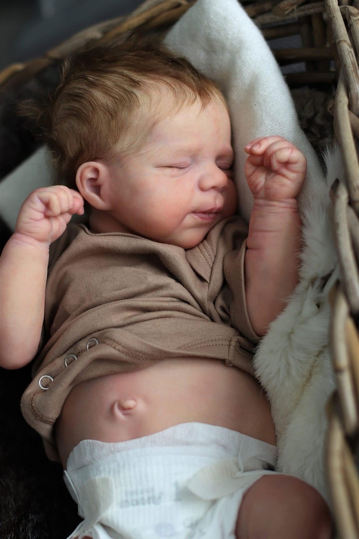 Anano 18-inch silicone reborn doll for realistic cuddling and display.