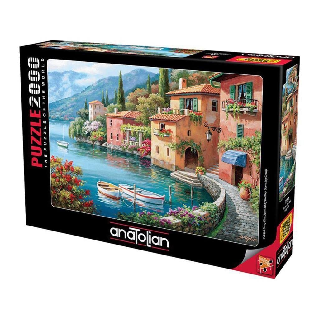Assembled Villagio Dal Lago 2000-piece puzzle reveals vibrant scene and rewarding completion.