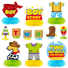Andi Cppss Boy Story honeycomb centerpiece brightens the birthday table