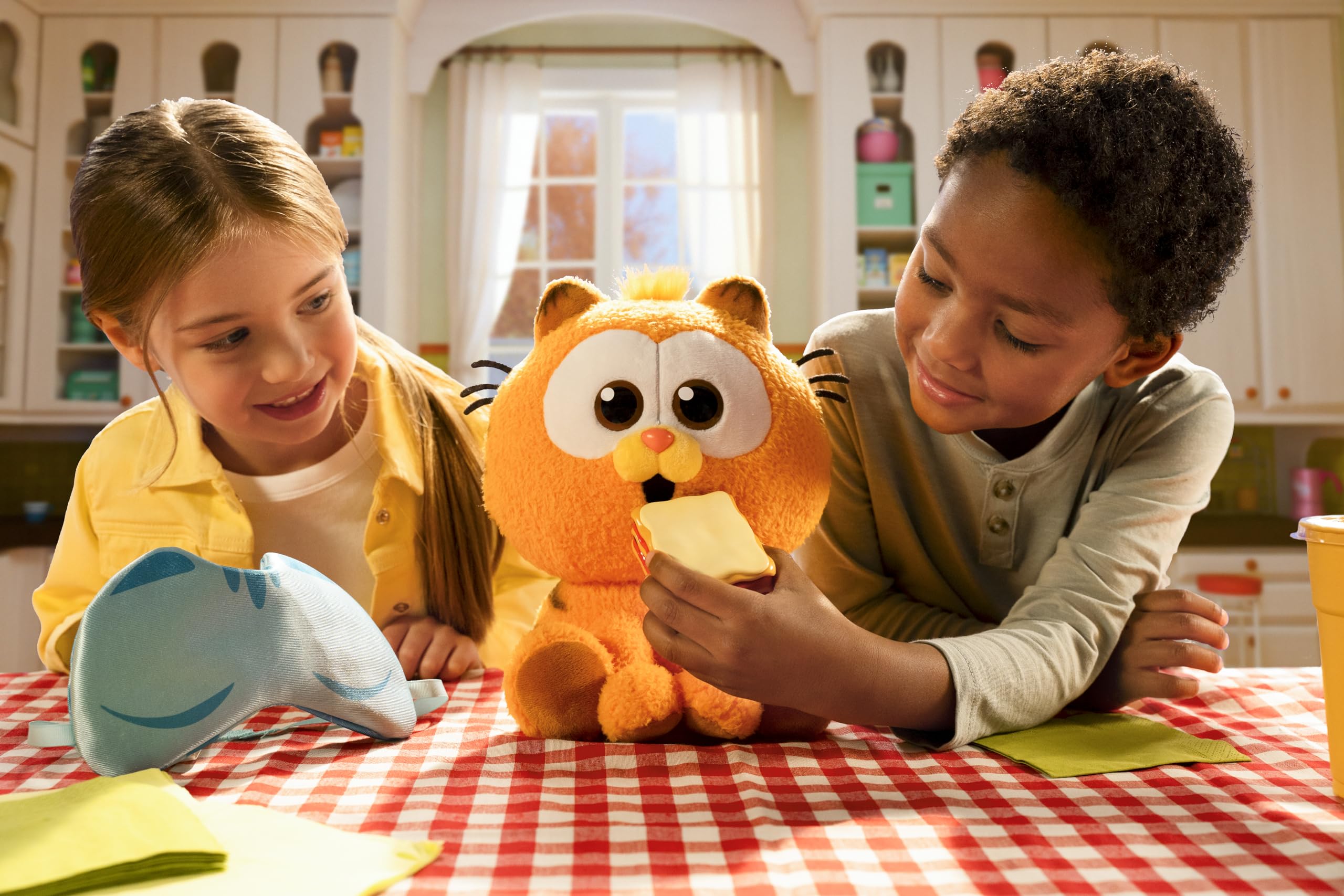 Animagic Baby Garfield sleeping with mask for soothing nap time.