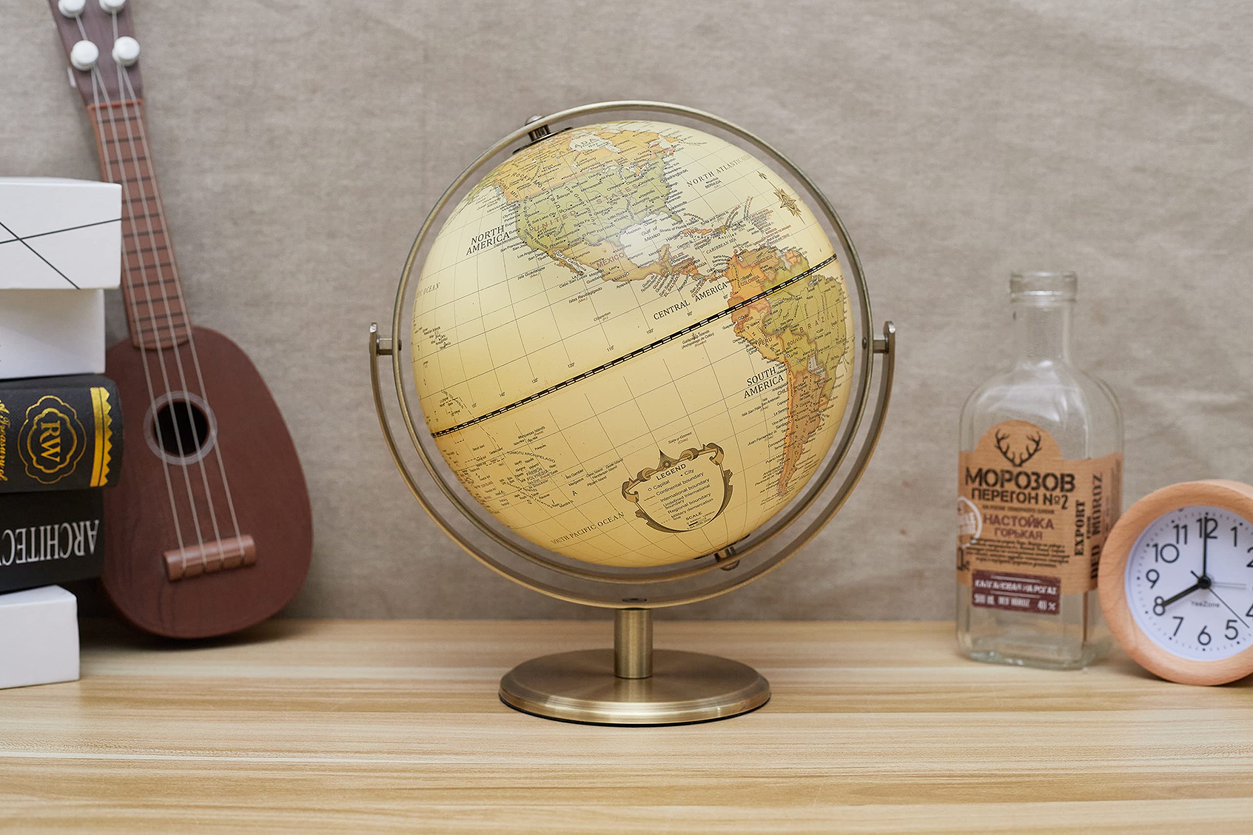 Annova 8-inch globe with bronze arc and base, ideal for geography checks.
