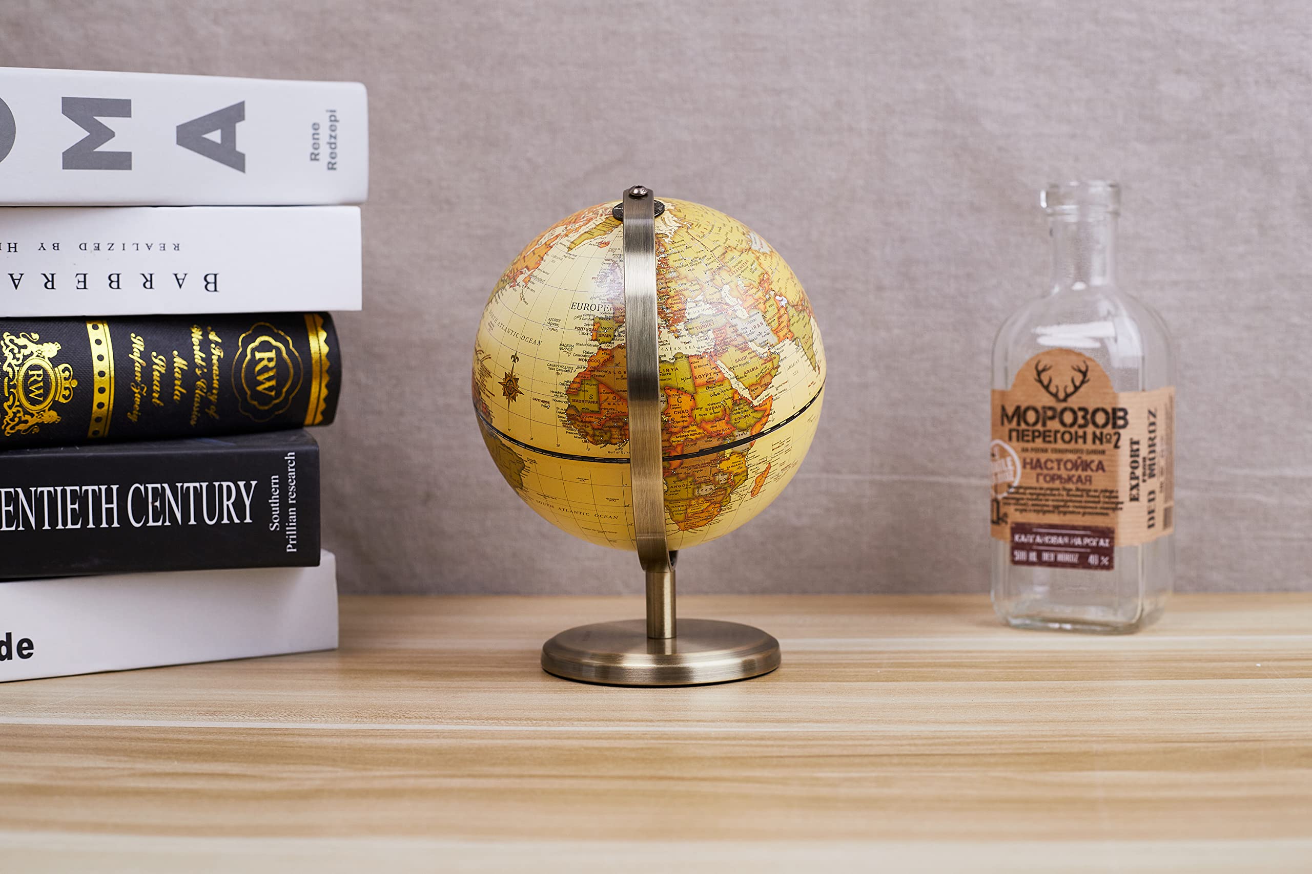 Brown finish complements any decor while highlighting geographic details