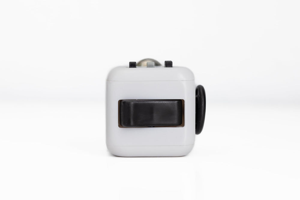 Antsy Labs Fidget Cube pocket-size design fits in hand, bag, or pocket.
