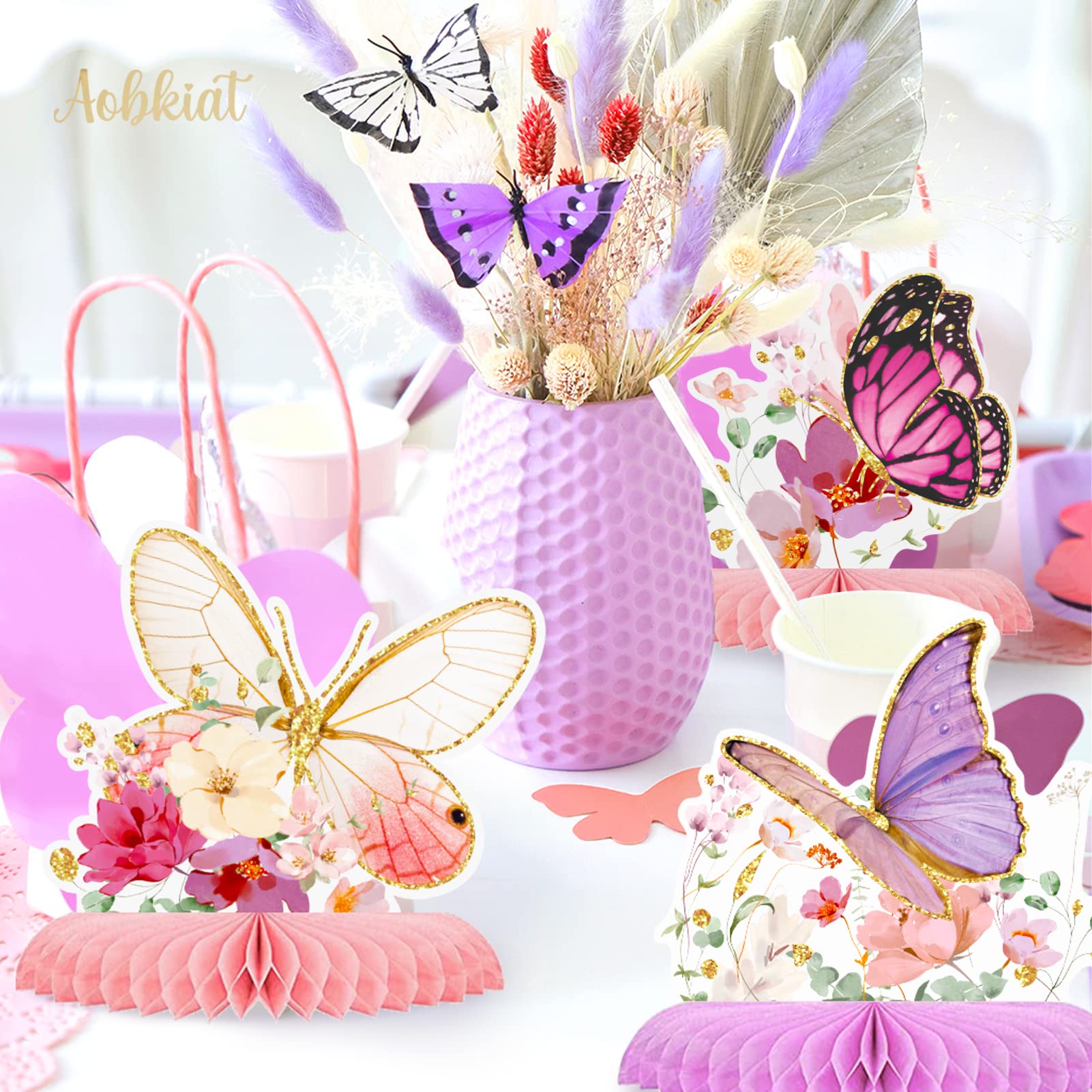 Aobkiat butterfly honeycomb centerpiece in lavender enhances wedding reception ambiance.