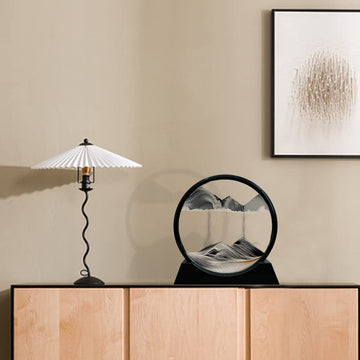 Aoderun glass circle sand pattern displaying 3D flow on a desk.