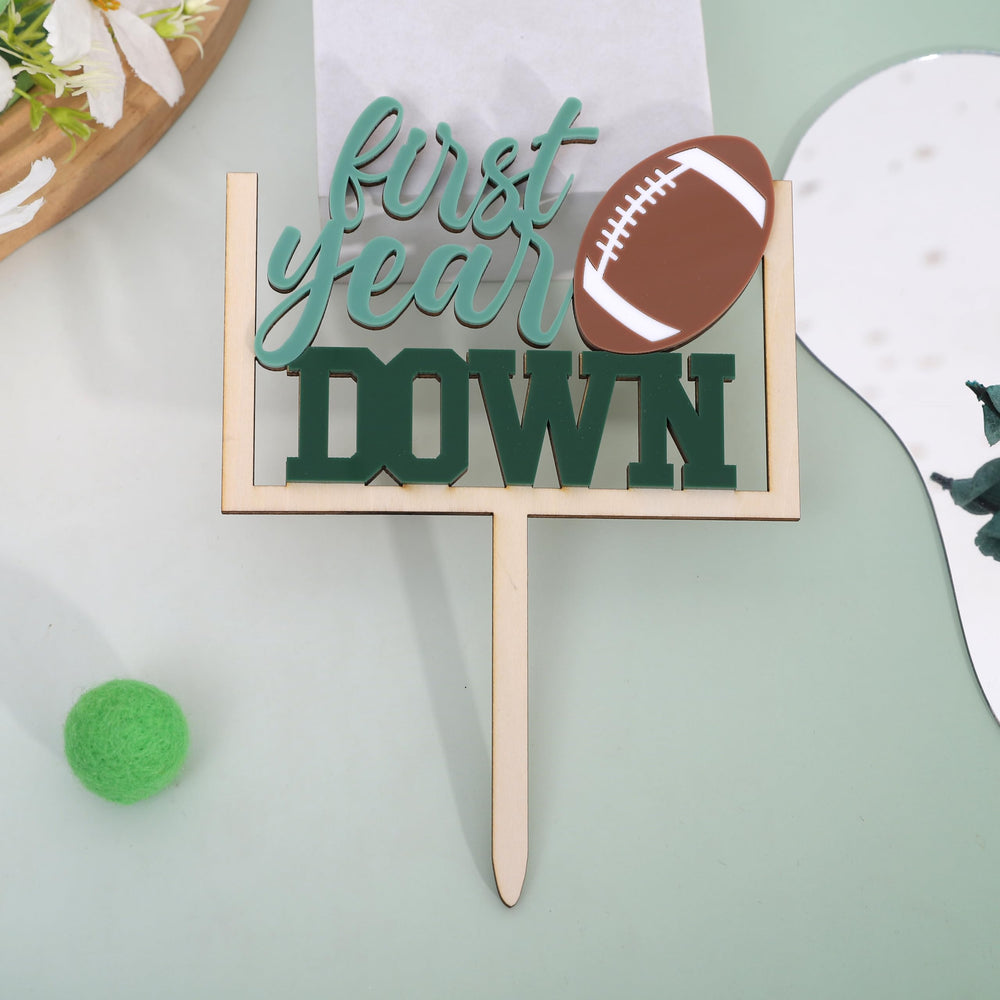 AOQURE wooden cake topper with sport theme used as a prop