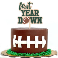AOQURE wooden football 1st birthday cake topper showcases natural wood grain.