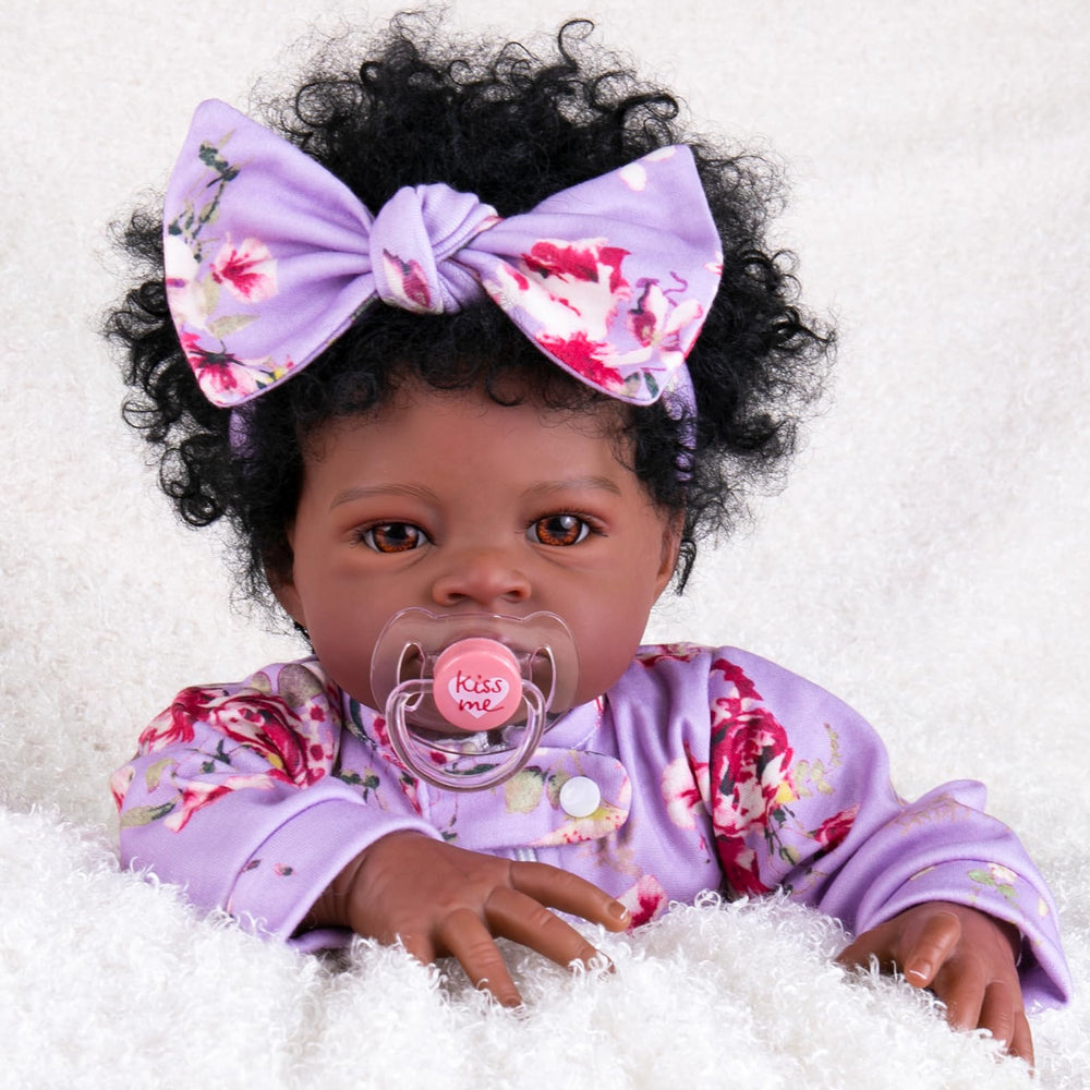 Aori Black Reborn Baby Doll Girl 20 inch with lifelike face for display and imaginative play.