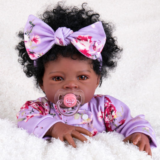 Aori Black Reborn Baby Doll Girl 20 inch with lifelike face for display and imaginative play.