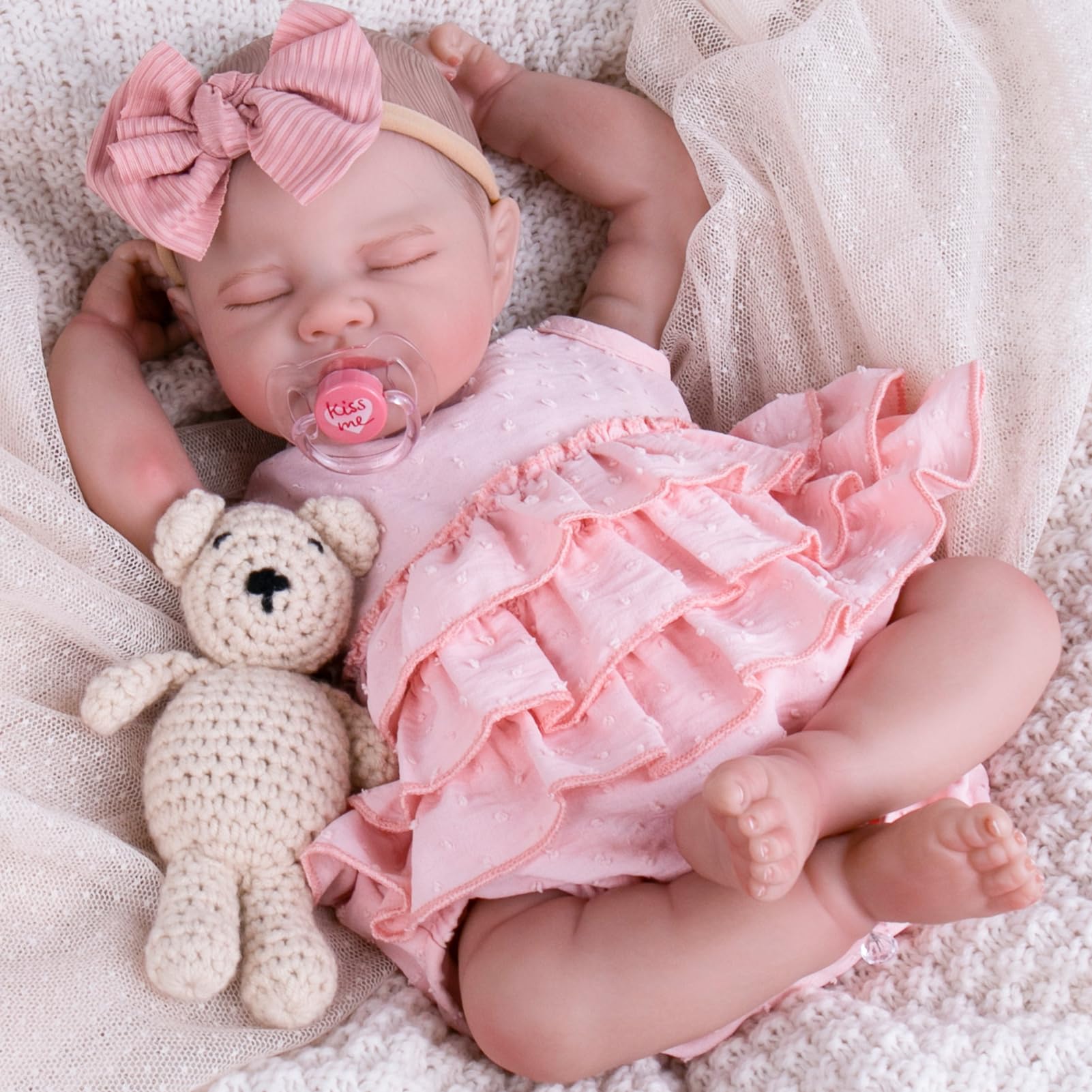 Aori pink dress set with socks and headband on reborn doll, versatile wardrobe option.