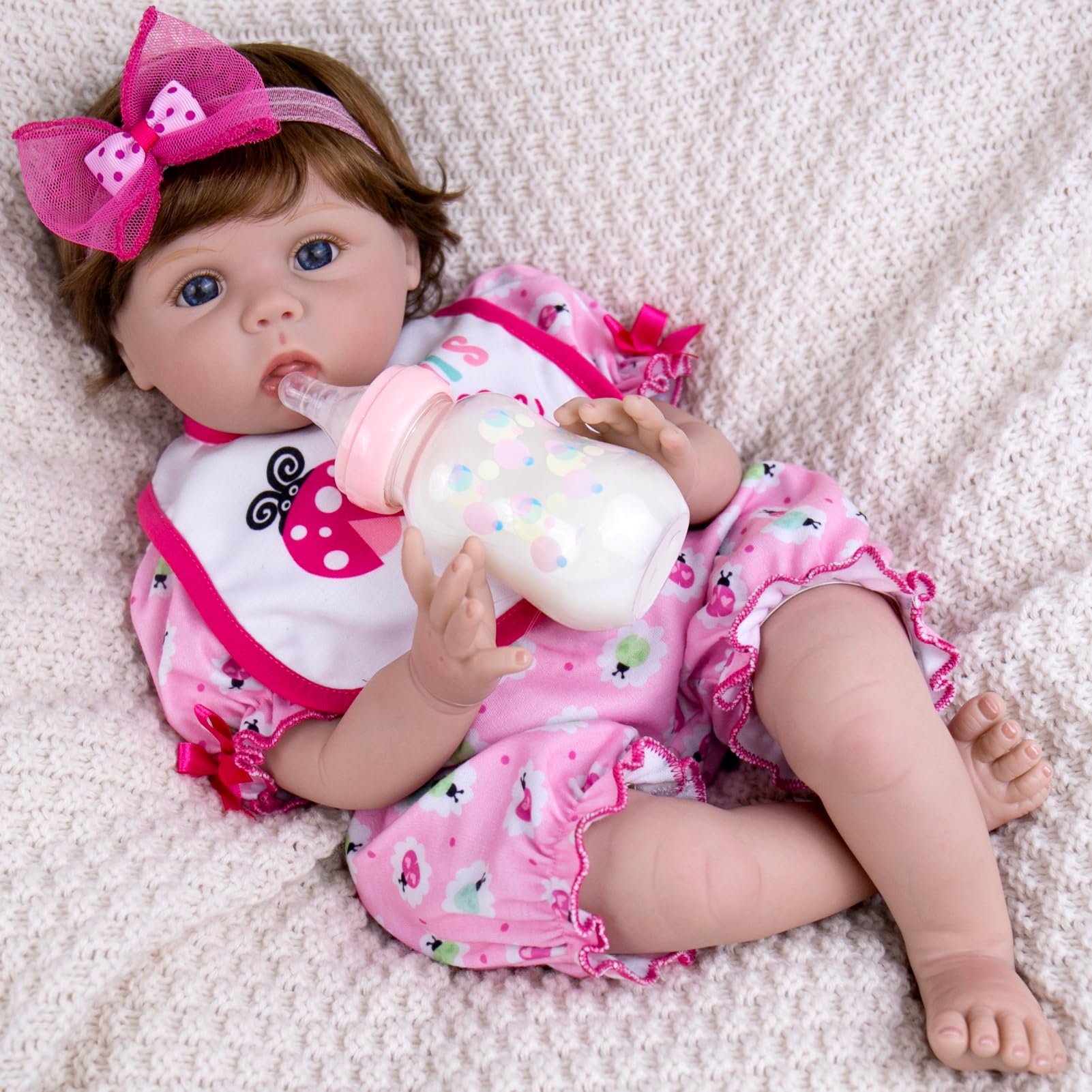 Aori 22-inch lifelike reborn doll with wig hair for immersive play.