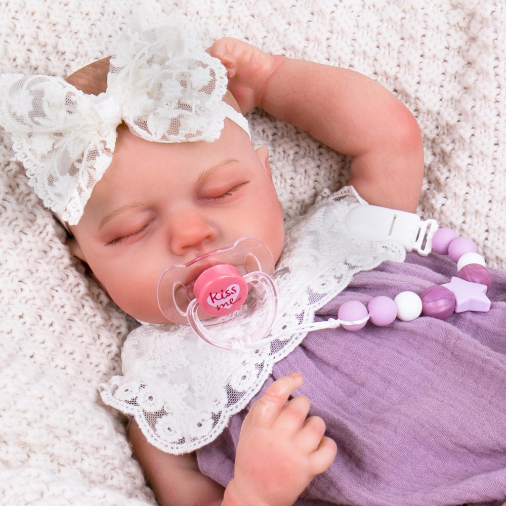 Aori pacifier clip with secure clasp protects fabrics during real play.