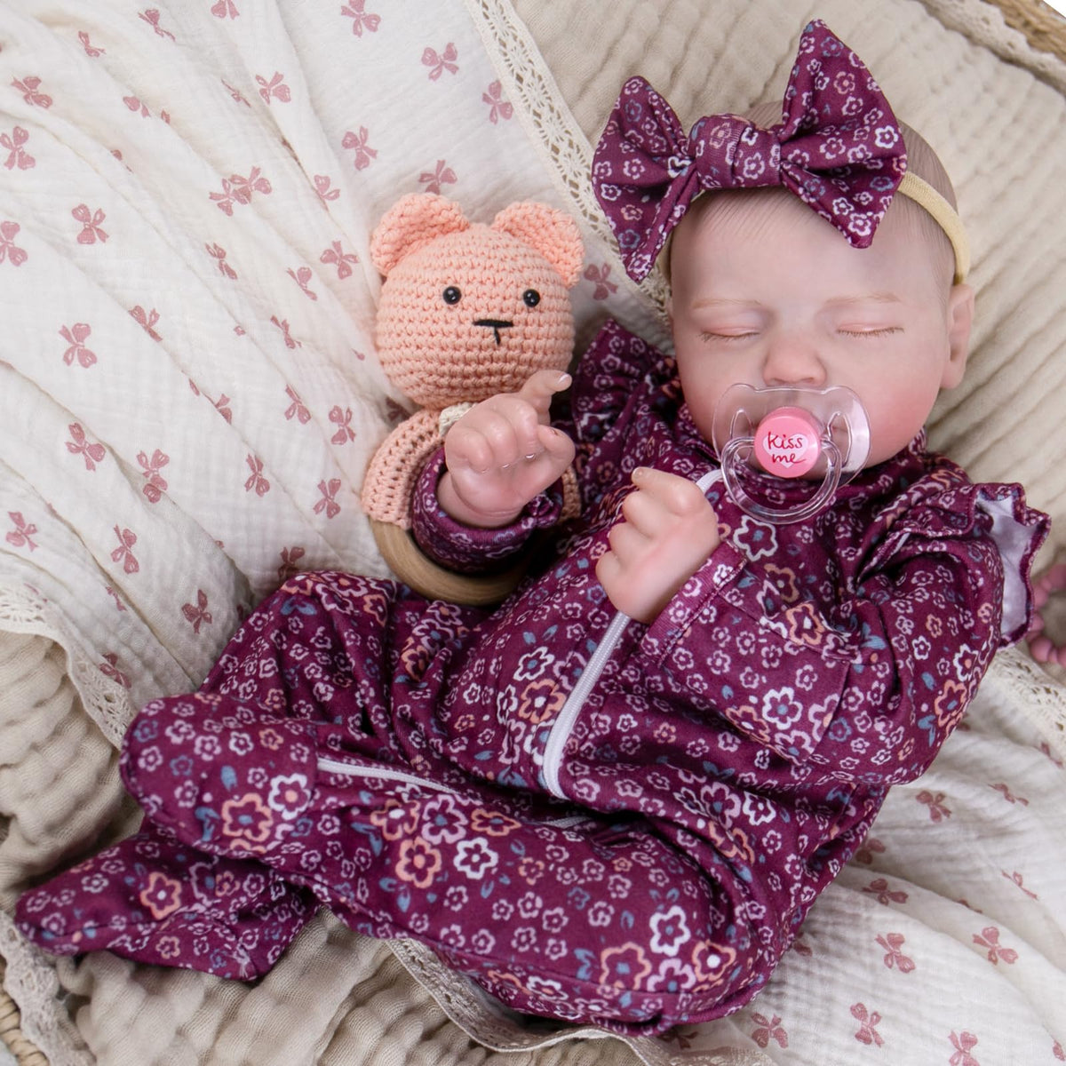 Aori Reborn doll 20inch sleeping girl demonstrates lifelike realism for imaginative play.
