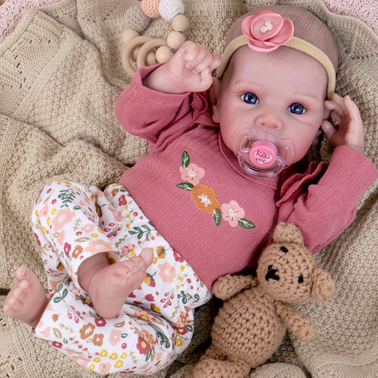 Aori Reborn baby doll face with hand-painted blush and lashes.
