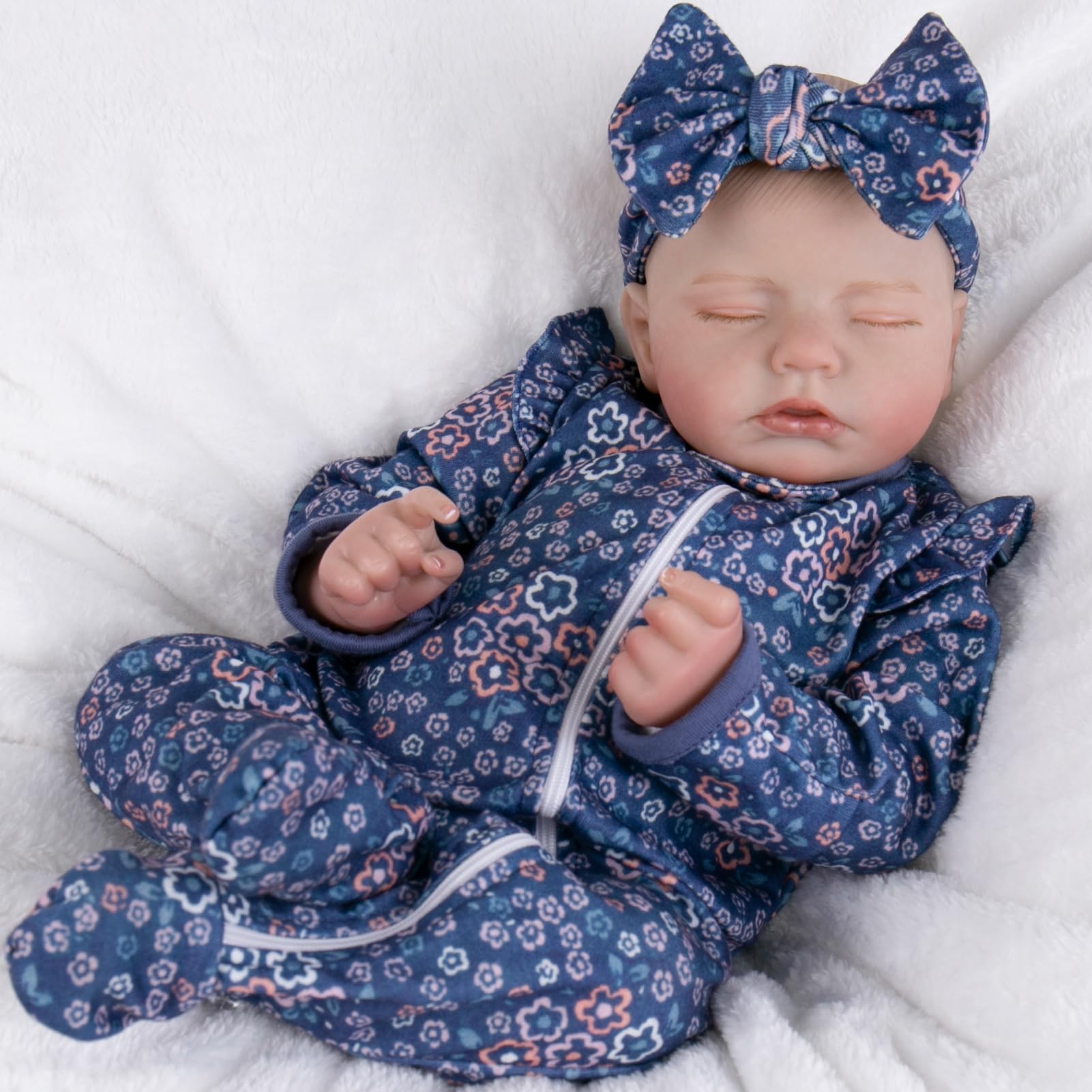 Aori reborn doll with hyper-realistic newborn outfit and accessories