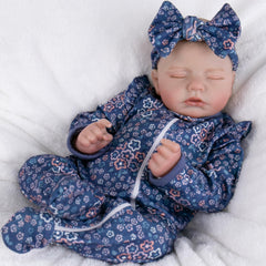 Aori reborn doll with hyper-realistic newborn outfit and accessories