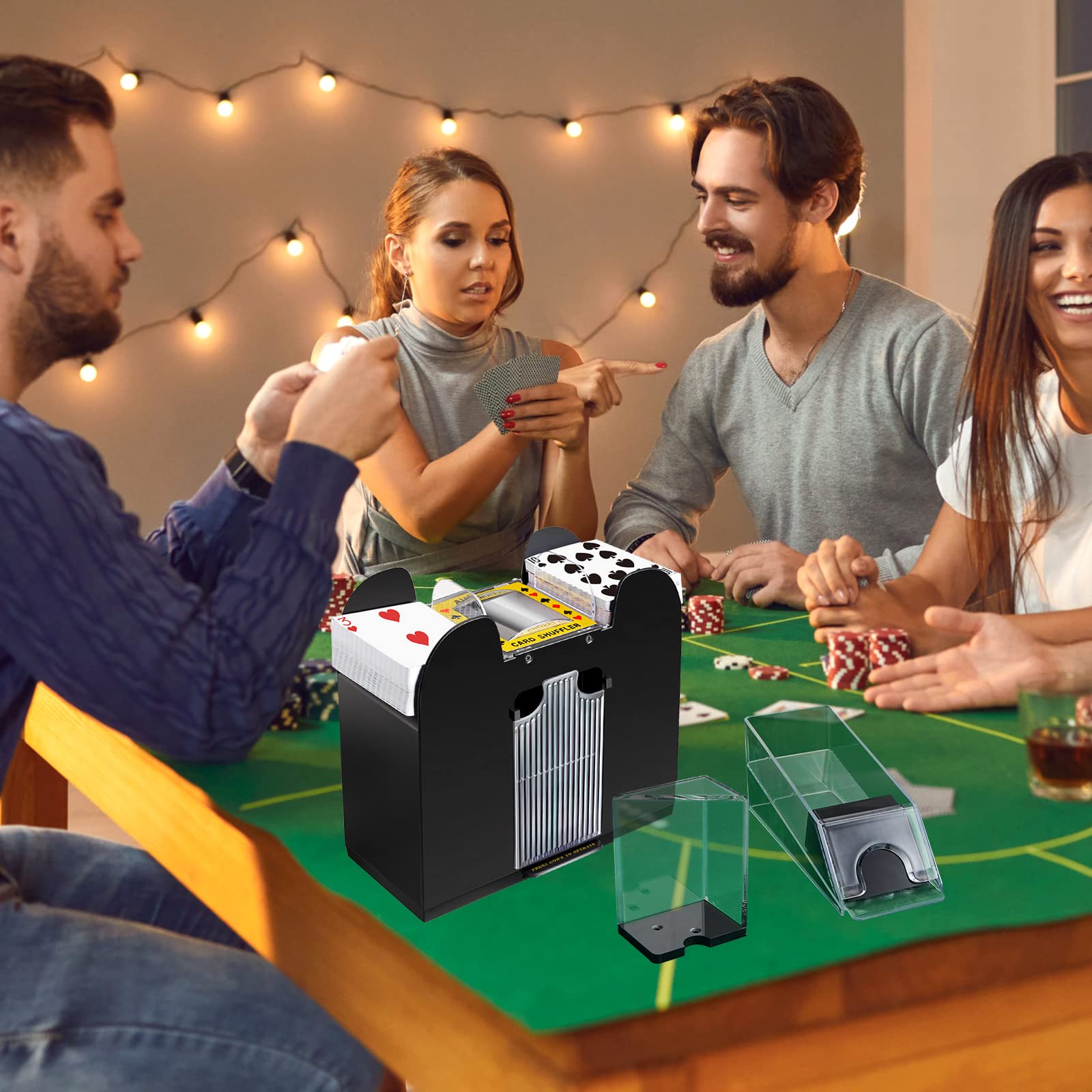 Aoriher game-night casino arrangement with shuffler, shoe and trays on table.