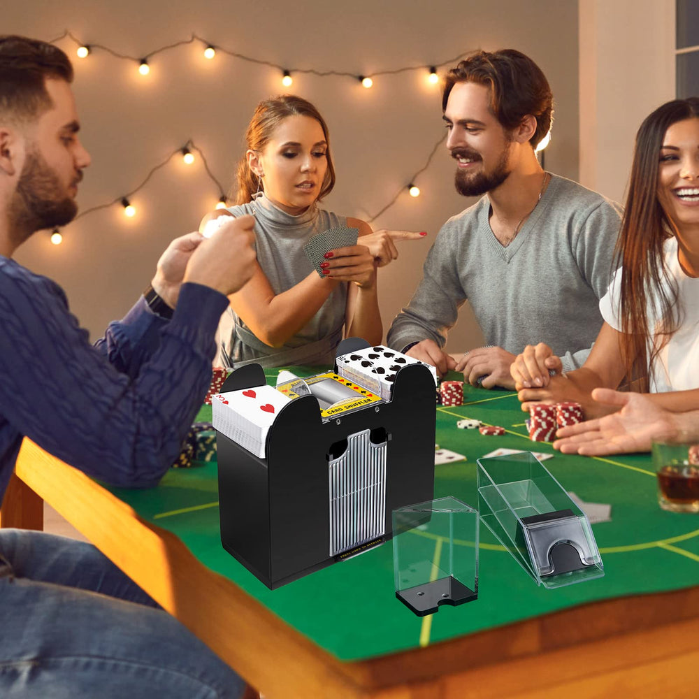 Aoriher game-night casino arrangement with shuffler, shoe and trays on table.