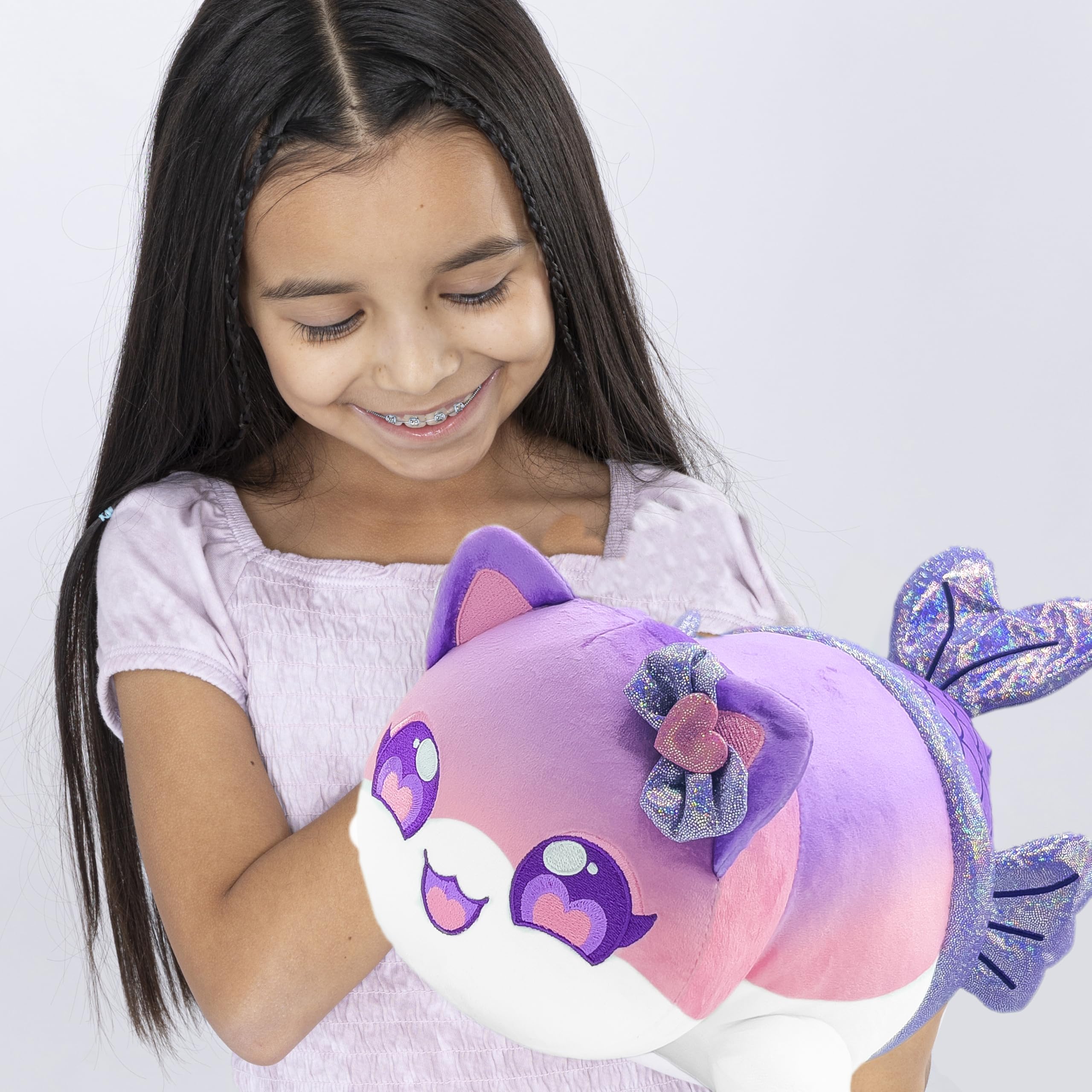 Unboxing Aphmau MeeMeows mystery plush in blind bag packaging.