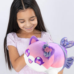 Unboxing Aphmau MeeMeows mystery plush in blind bag packaging.