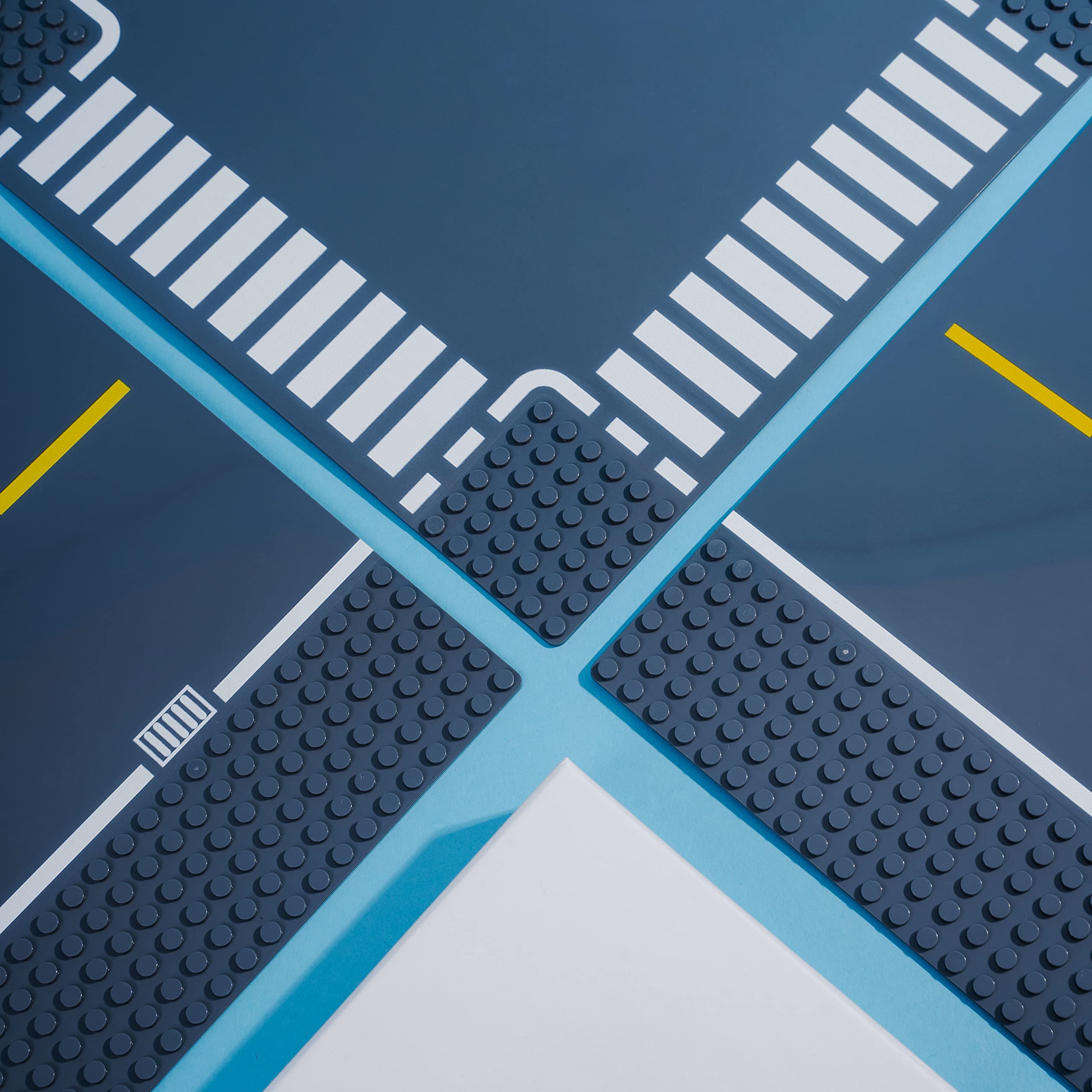 Apostrophe Games curved gray road baseplate for smooth bends.