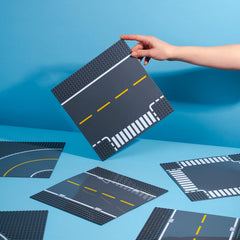 Apostrophe Games straight gray road baseplate for modular city design.