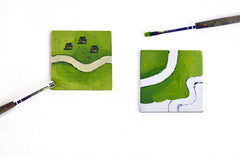 Apostrophe Games square tiles sized like Carcassonne for easy replacements.