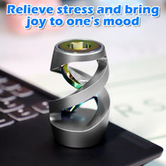 Apqdw CNC machined aluminum toy sits on a flat surface.