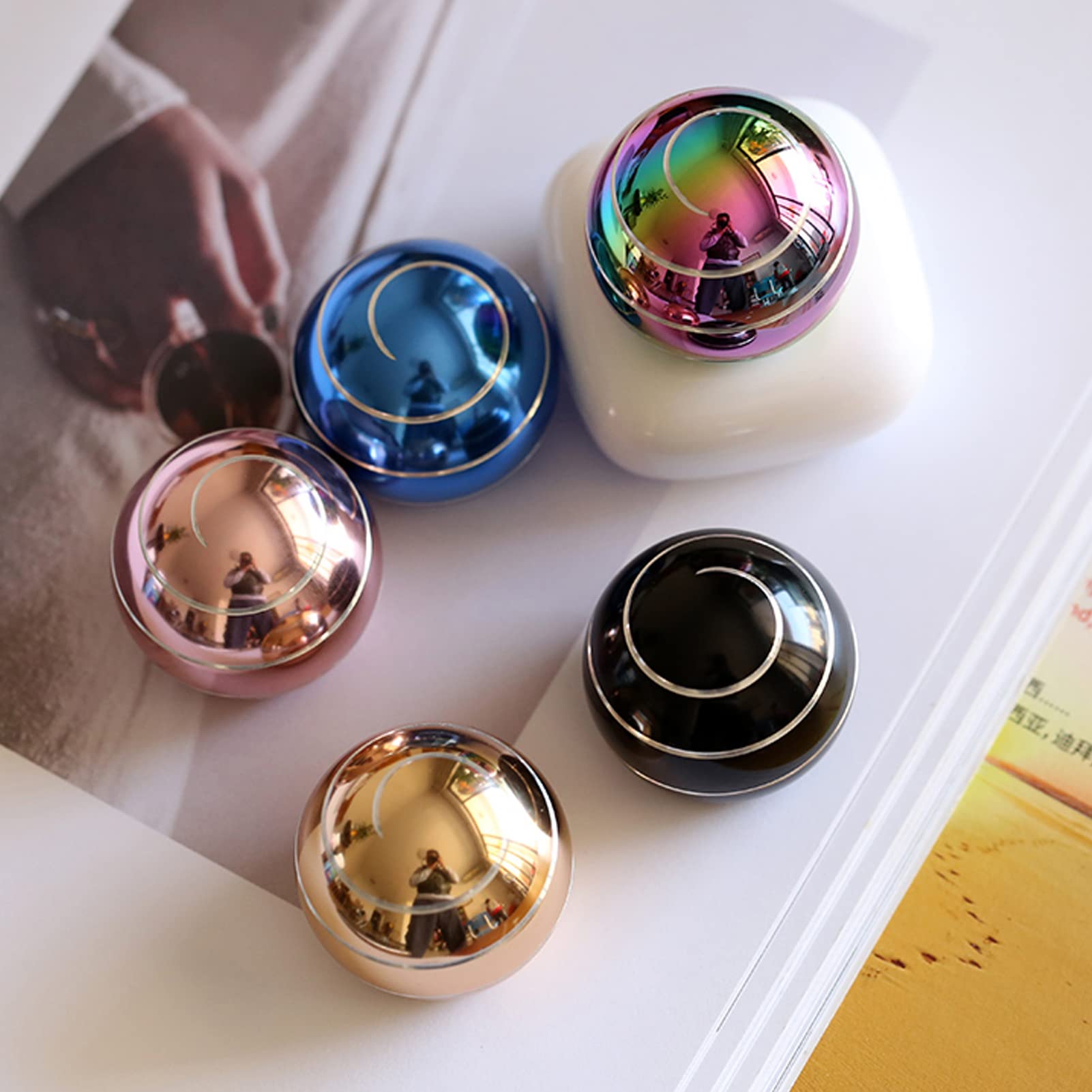 Apqdw kinetic desk toy optical illusion spin provides calming focus.