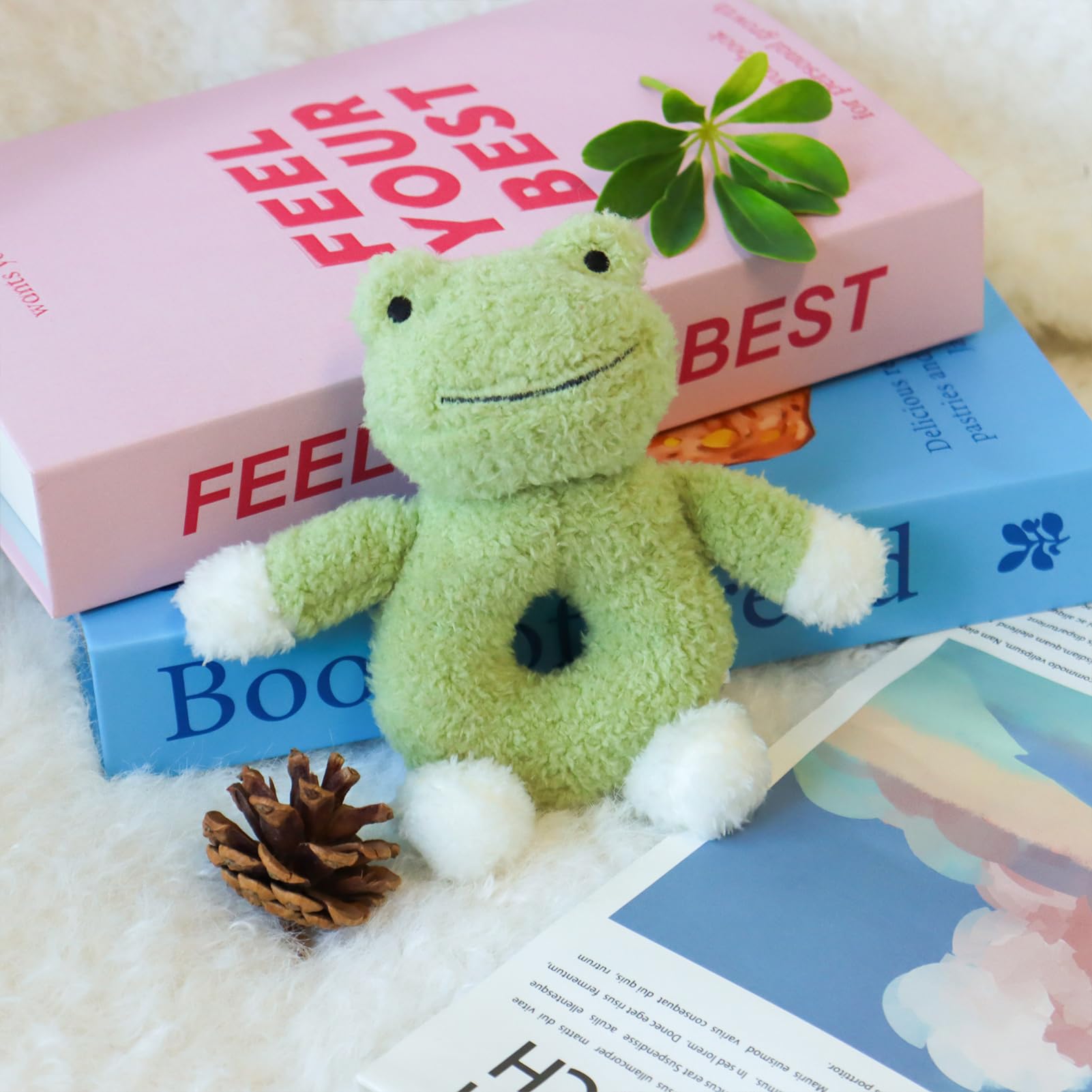 Apricot Lamb plush frog close-up shows fluffy material for infant play