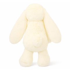 Aqushymallow Cow Bunny cream color with pink nose cradling heart.