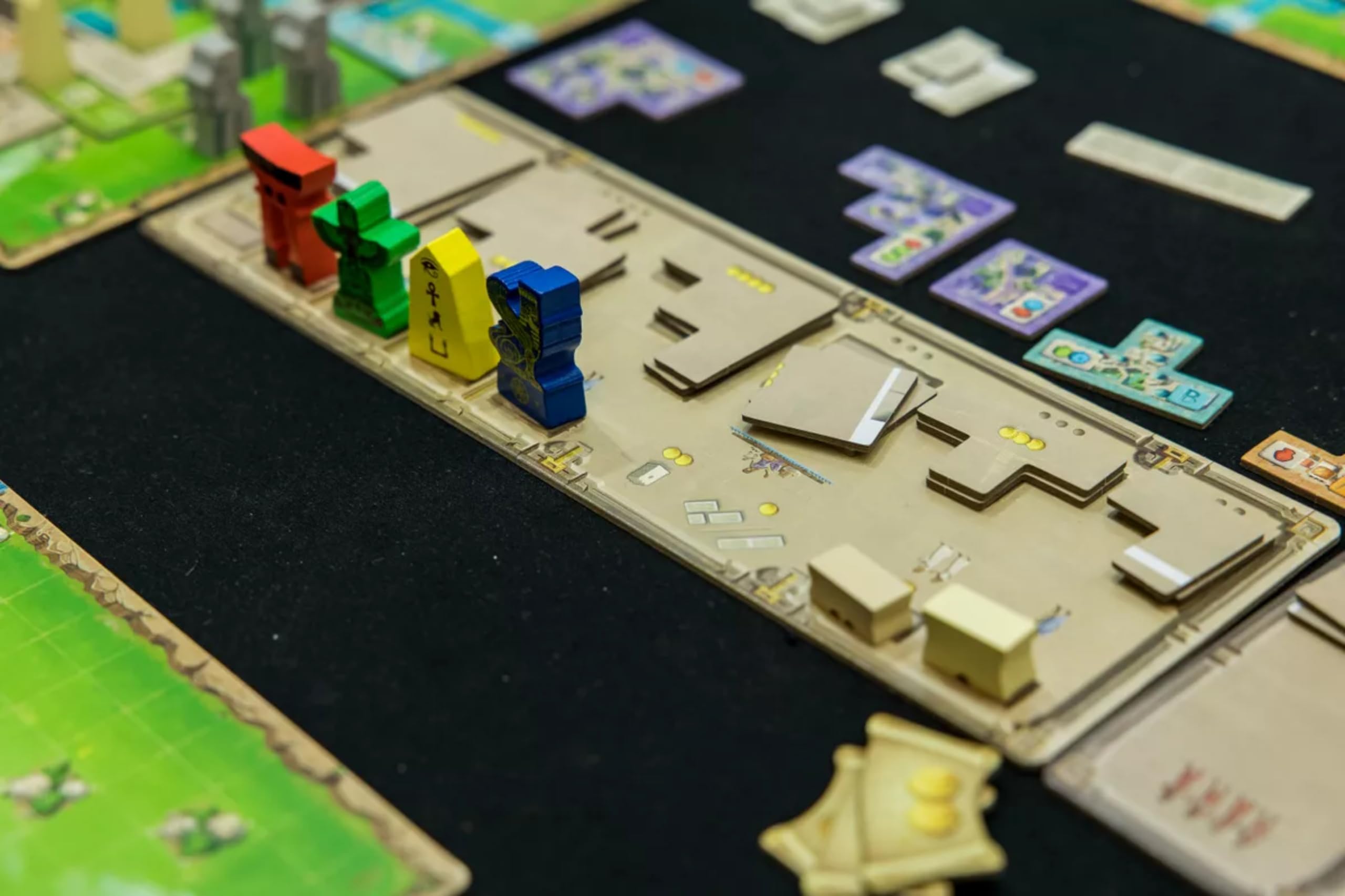 Arcane Wonders victory rings artwork captures endgame scoring and ultimate city glory.