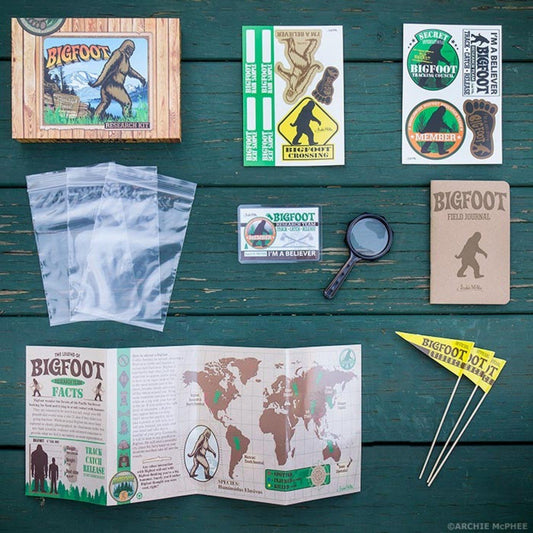 Archie McPhee Bigfoot kit items inside support imaginative outdoor play and learning.