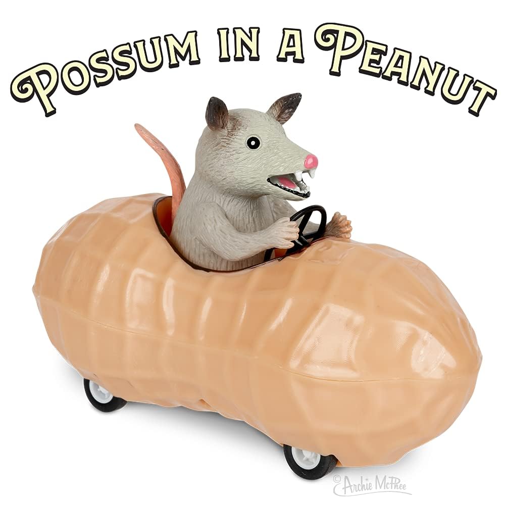 Archie McPhee possum in a peanut pull-back toy car side view showing compact 5-inch size.