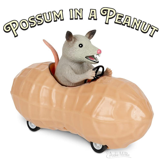 Archie McPhee possum in a peanut pull-back toy car side view showing compact 5-inch size.