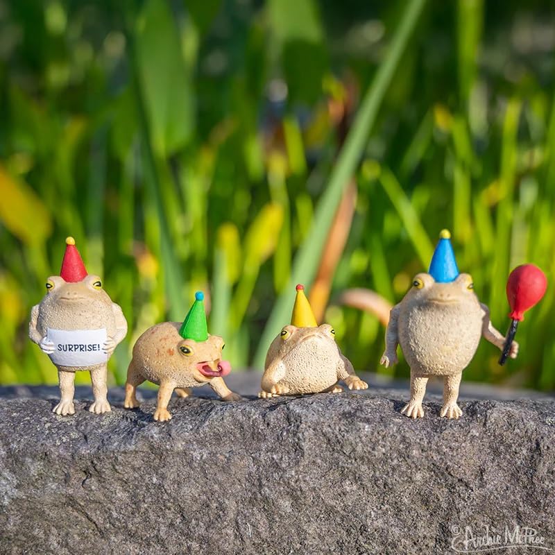 Archie McPhee rain frogs, collectible figures ideal for playful shelf accents and novelty gifting.