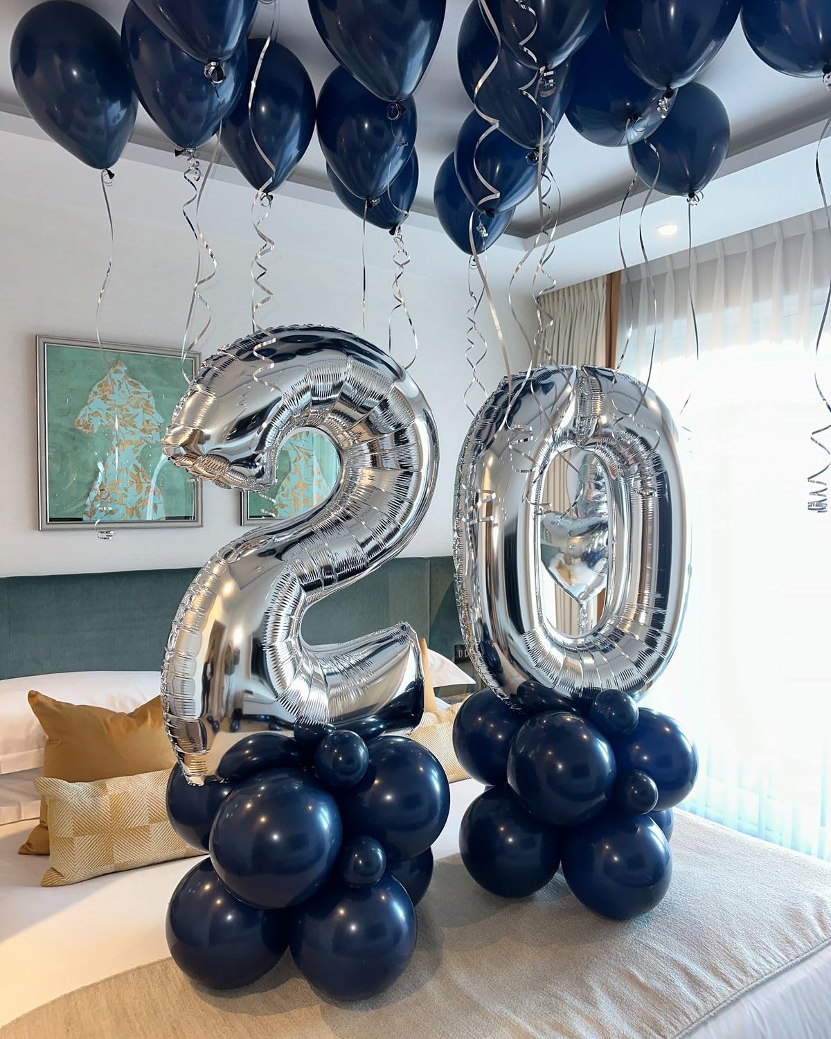 Argthjy 40-inch blue number balloon creates vibrant backdrop for birthdays