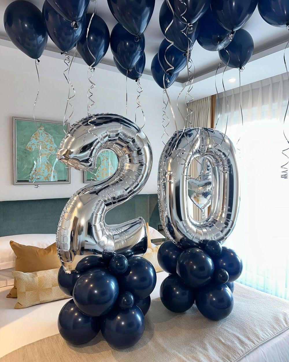 Argthjy 40-inch blue number balloon creates vibrant backdrop for birthdays