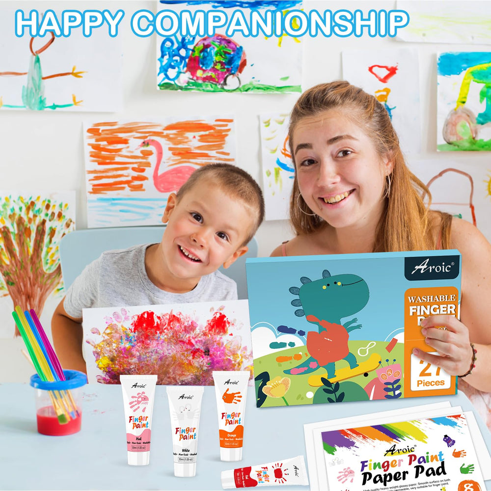 AROIC kids enjoy a creative painting session with safe materials.