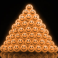 ArtCreativity glow-in-the-dark smiley-face ball for night play and high bounce.