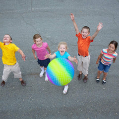 ArtCreativity rainbow playground ball at the beach makes colorful play moments.
