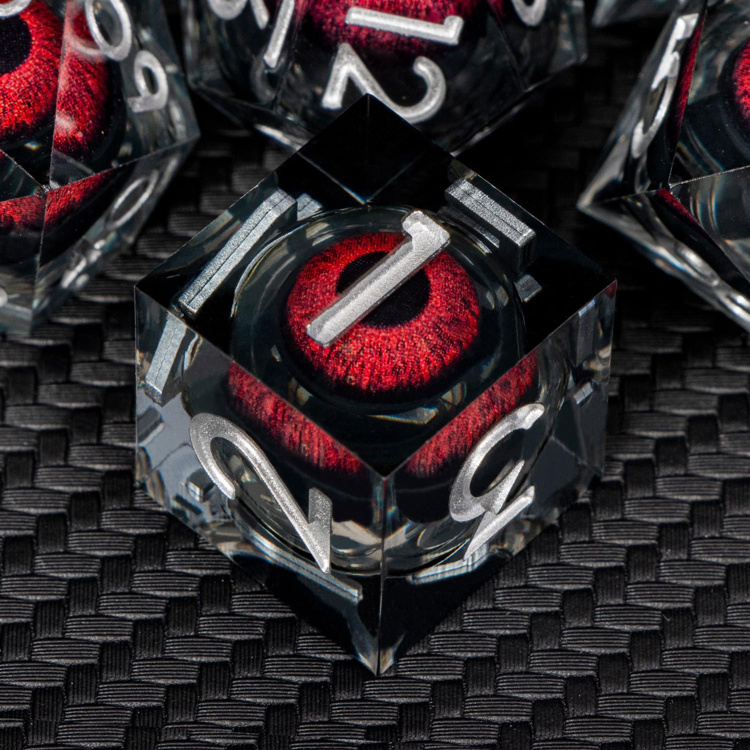 ARUOHHA D4-D20 and percentile dice with dragon eye design for immersive play.