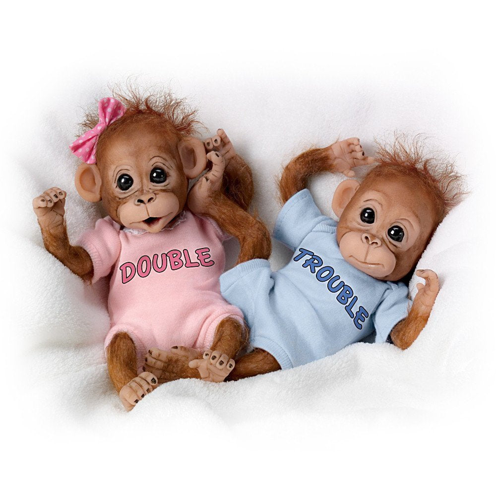 The Ashton-Drake Galleries Double Trouble twins display lifelike expressions for charming display and imaginative play.