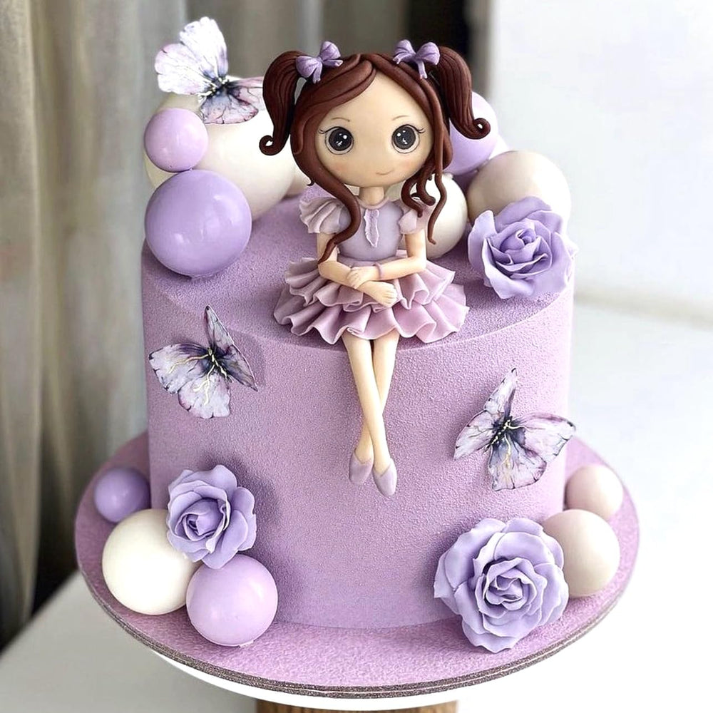 ASTARON colorful ball toppers on a cake, ideal for birthday celebrations and baby showers.