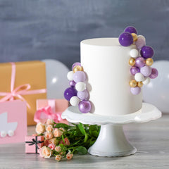 ASTARON white 3 cm ball toppers provide clean contrast
