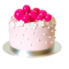 ASTARON hot pink ball cake topper on cake elevates celebration aesthetics.