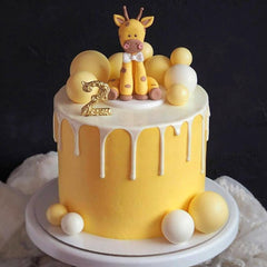 ASTARON yellow 1.57-inch ball cake topper makes a bold cake statement